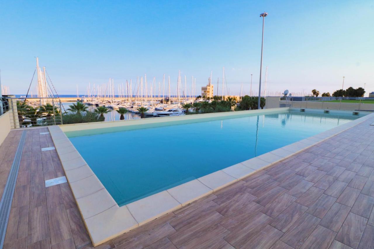 H11 Luxury 9A - Porto - Piscina - Jacuzzi Daire Santo Stefano al Mare Dış mekan fotoğraf