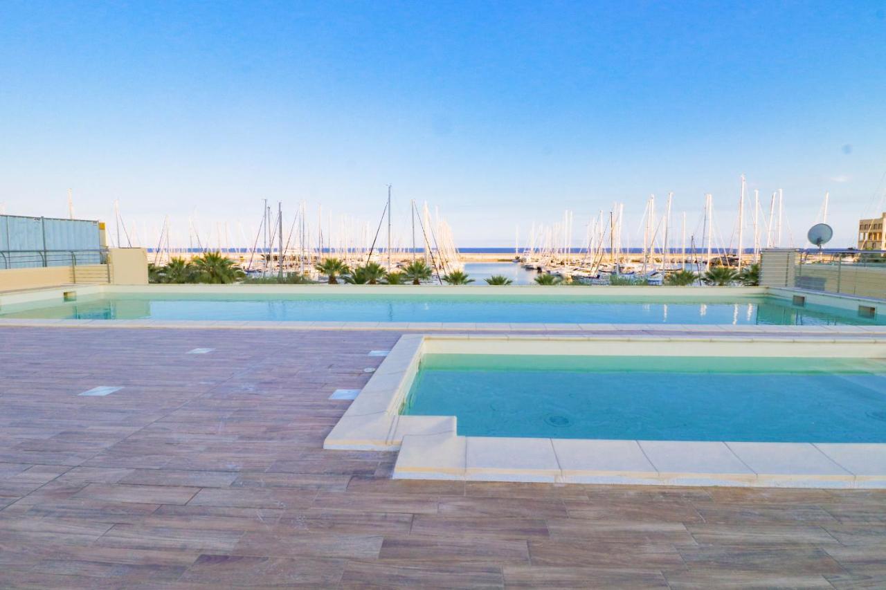 H11 Luxury 9A - Porto - Piscina - Jacuzzi Daire Santo Stefano al Mare Dış mekan fotoğraf